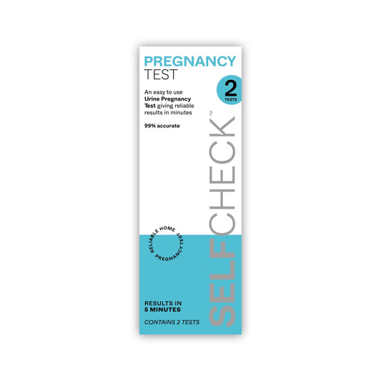 SELFCHECK Pregnancy Test Kit on a white background
